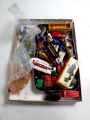 A box containing a quantity of 20th century die cast vehicles,