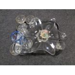 A tray of assorted glass wares to include Babycham glasses, commemorative vase, paperweight,