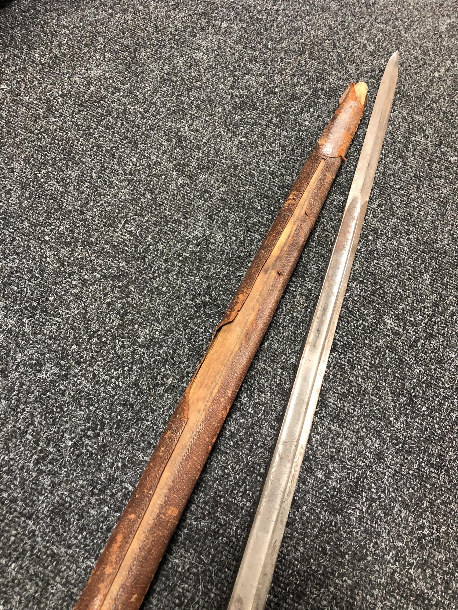 A British 1896 pattern heavy cavalry sword by Sandilands & Son of London, in leather scabbard. - Image 11 of 11