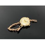 A lady's 9ct gold cased wristwatch on 9ct gold strap (a/f).