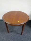 An Edwardian circular inlaid mahogany occasional table