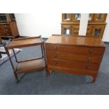 A twentieth century oak three drawer chest together with an oak barley twist trolley