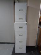A metal four drawer filing cabinet together with a further two drawer cabinet