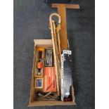 A box of draughtsman's squares, music stand, walking sticks, vintage hand tools.