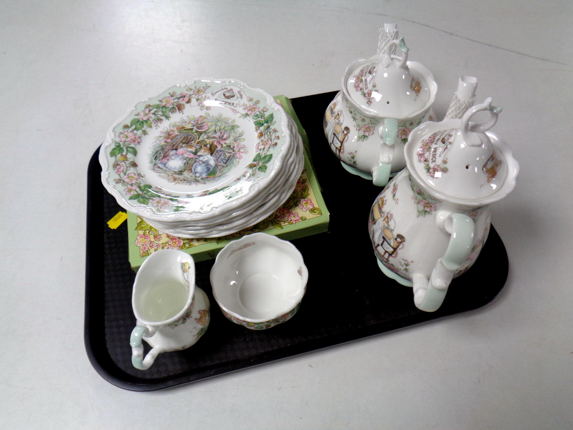 A tray containing four piece Royal Doulton Brambley Hedge tea service together with eight further