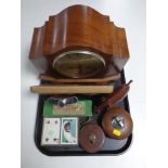 A tray of walnut cased Art Deco mantel clock (a/f), hip flask, table lighter,