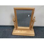 A pine dressing table mirror.