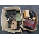 Two boxes of a quantity of antique and later projectors, reels, cameras cases etc.