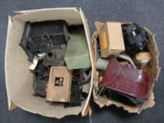 Two boxes of a quantity of antique and later projectors, reels, cameras cases etc.