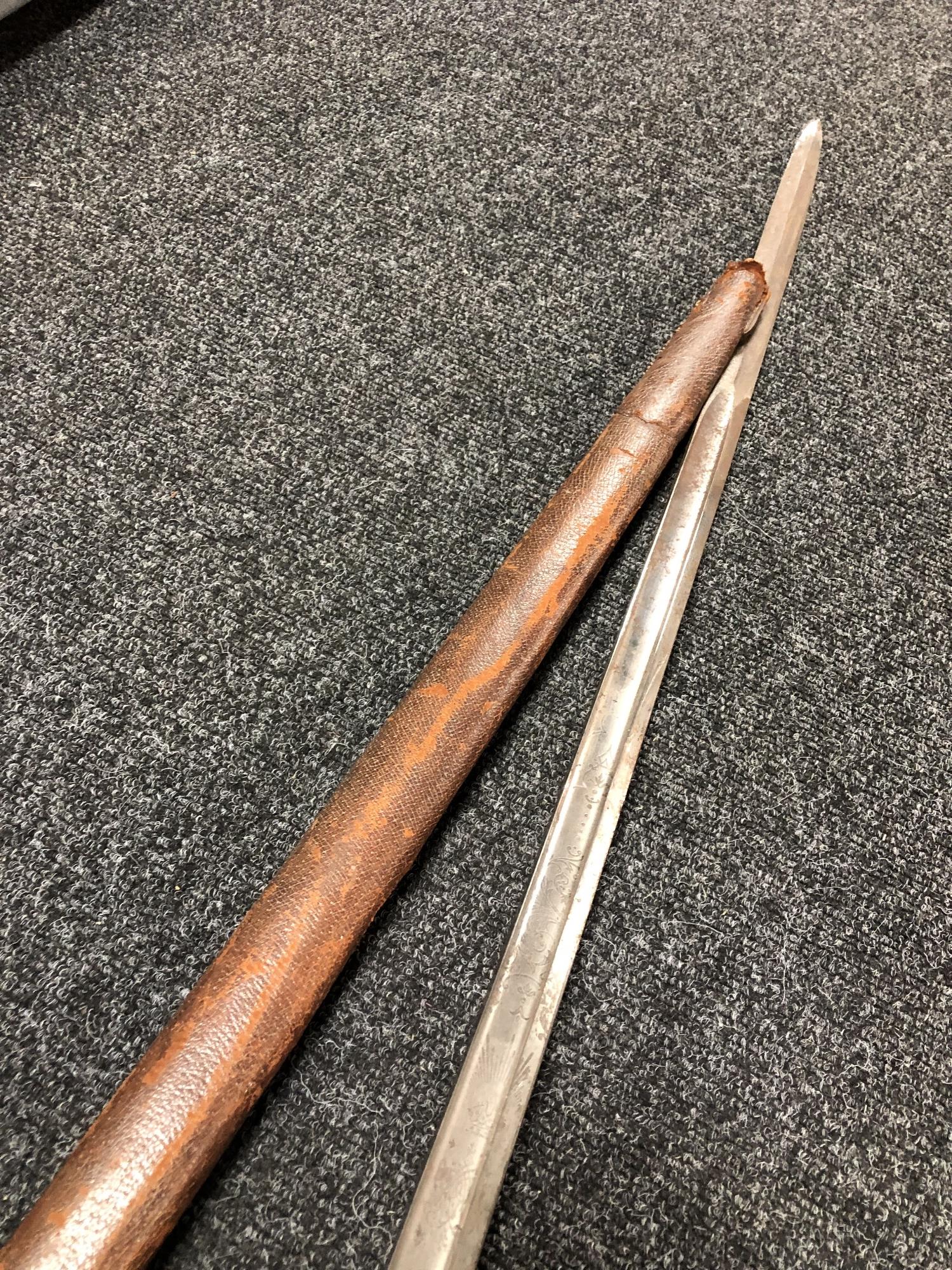 A British 1896 pattern heavy cavalry sword by Sandilands & Son of London, in leather scabbard. - Image 10 of 11