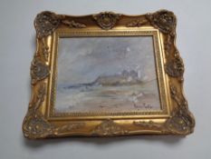 A Nancie Foster oil on board, Bamburgh Castle, in ornate gilt frame.