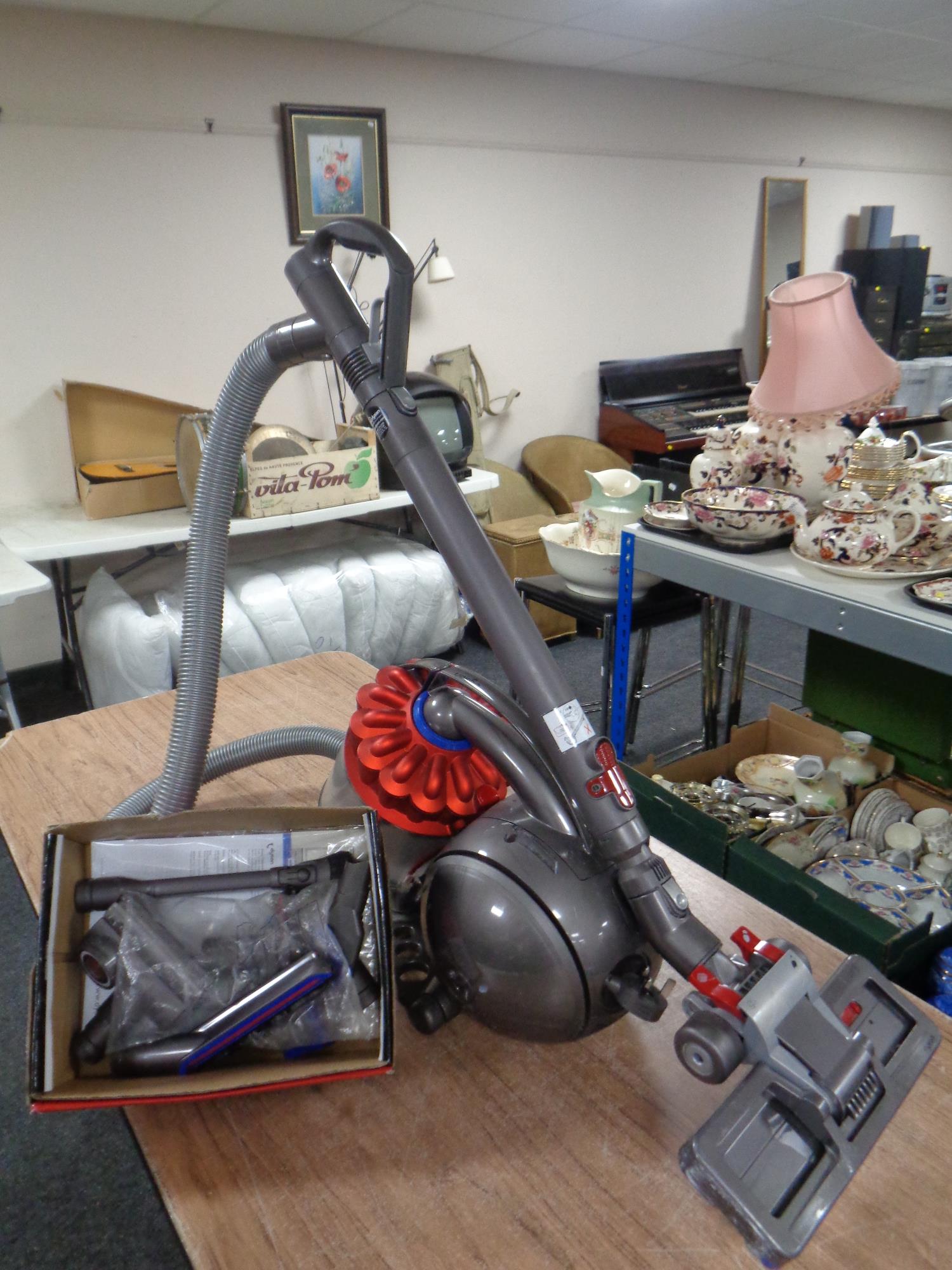 A Dyson DC 53 ball vacuum with accessories