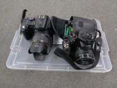 Two Fujufilm cameras, a Finepix S and a S9600 , with lenses,