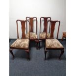 A set of four Queen Anne style dining chairs