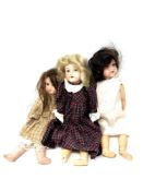 Three Armand Marseille bisque-headed dolls (one a/f).