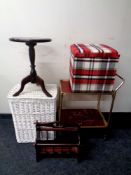 A gilt two tier tier trolley together with a wicker laundry basket, mahogany wine table,