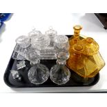 A tray of three 20th century cut glass trinket sets,