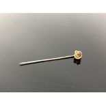 A 15ct gold ruby stick pin. CONDITION REPORT: 1.