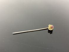 A 15ct gold ruby stick pin. CONDITION REPORT: 1.