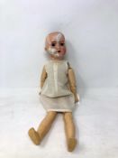 An Armand Marseille bisque-headed jointed doll stamped AM Germany 390 A2/0M (a/f)