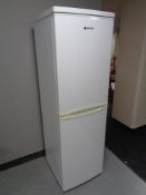 A Hoover upright fridge freezer.