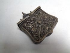 A 19th century cast metal belt mounted shot casket