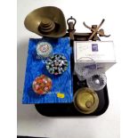 A tray of set of vintage scales with weights, three glass paperweights,