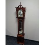 A Tempus Fugit granddaughter clock.