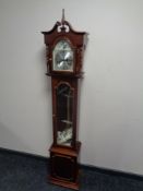 A Tempus Fugit granddaughter clock.