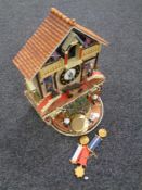 A Bradford Editions The Faithful Fuzzies Mighty Marines novelty cuckoo clock with pendulum and