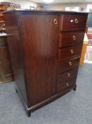 A Stag Minstrel gentleman's wardrobe fitted six drawers