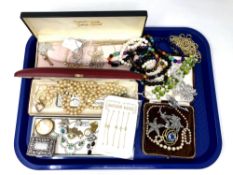 A tray containing costume jewellery, silver chains, marcasite items, beaded necklaces,