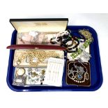 A tray containing costume jewellery, silver chains, marcasite items, beaded necklaces,