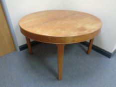 A 20th century Danish circular teak dining table
