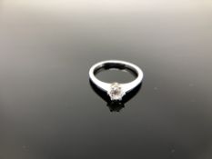 A 9ct white gold CZ solitaire ring, size M CONDITION REPORT: 2.