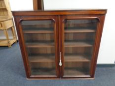 A Victorian mahogany double door glazed bookcase top