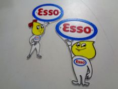 Two cast iron Esso plaques,