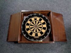 A dart board in cabinet
