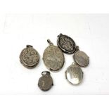 Six silver lockets