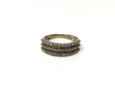 A 9ct white gold five row diamond half eternity ring