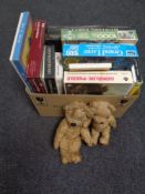 A box of assorted puzzles and games,