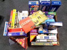 Three boxes containing a large quantity of assorted board games,