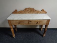 A Victorian pine marble top wash stand fitted two drawers