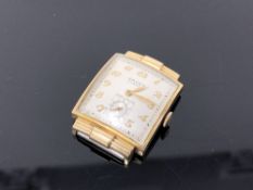 A 1960's Art Deco Gruen Curvex Precision gold filled wristwatch