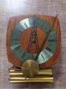 A 20th century Brixton wall clock with pendulum and weights