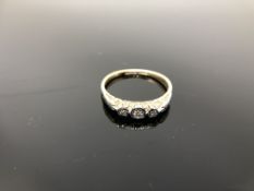 An 18ct gold and platinum diamond set ring, size O CONDITION REPORT: 2.