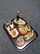 A tray containing six Border Fine Arts figures to include Baby Squirrel and Blue Tit,