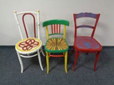 Three painted Bentwood kitchen chairs together with a pine two tier telephone table