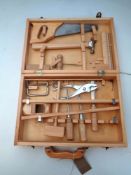 A pine cased child's toolkit