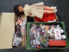 Two boxes containing 20th century dolls, doll's accessories and clothes,